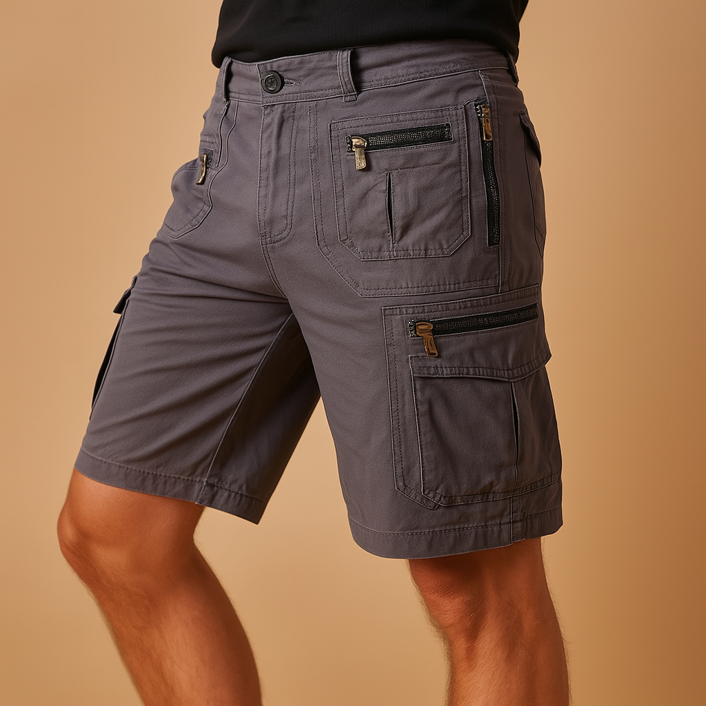 Men’s cargo shorts with zipper and flap pockets, featuring a straight knee-length fit and breathable fabric for outdoor and everyday wear.