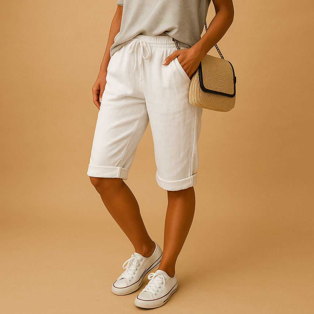 Women’s casual capri pants with elastic waistband, drawstring, and rolled hem design, perfect for spring and summer wear.
