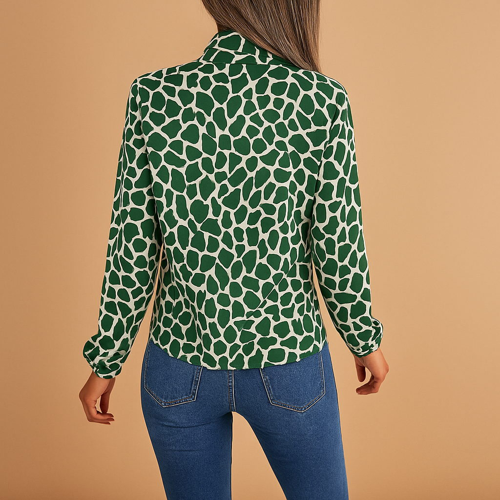 Women’s elegant green blouse with a polka dot pattern and bow detail, suitable for office outfits and casual everyday wear.