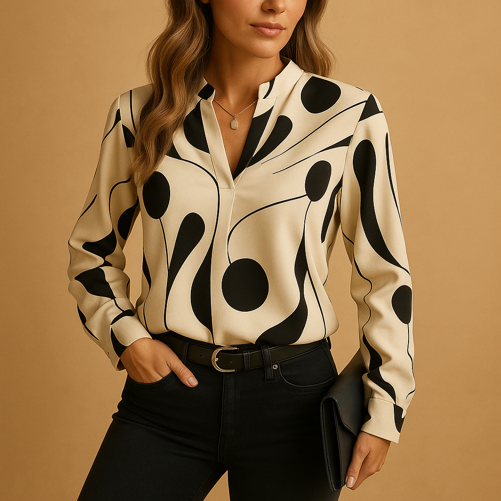 Elegant printed blouse for women with a smooth comfortable fit, suitable for casual outfits, office wear, and formal occasions.
