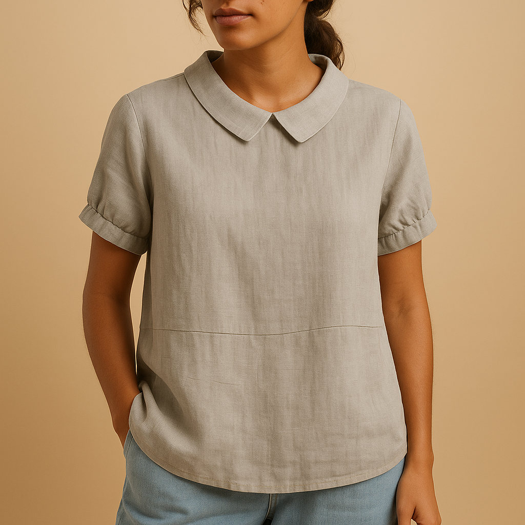 Women’s elegant tailored blouse with a classic design, suitable for office outfits, formal occasions, and smart casual looks.