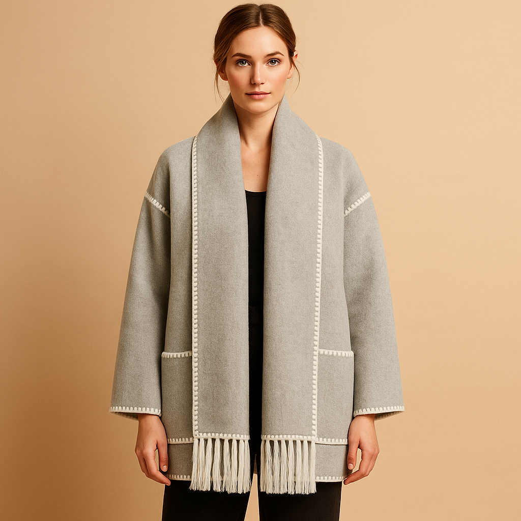 Women’s elegant winter coat with a tailored fit, matching belt, and removable scarf, suitable for cold days, daily wear, and special occasions.