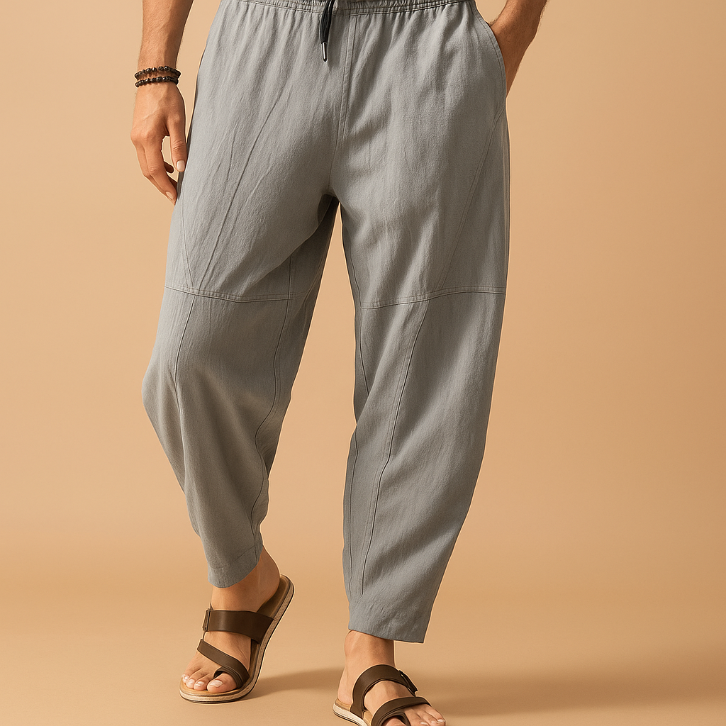 Men’s loose cotton pants with breathable fabric and relaxed fit, perfect for warm days, travel, or casual everyday wear.