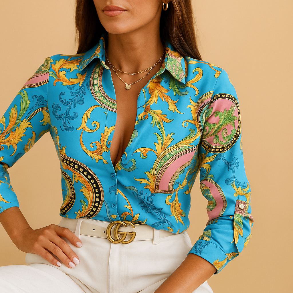 Women’s blouse with a wrap neckline and striking print, suitable for office wear, evenings out, and stylish everyday outfits.