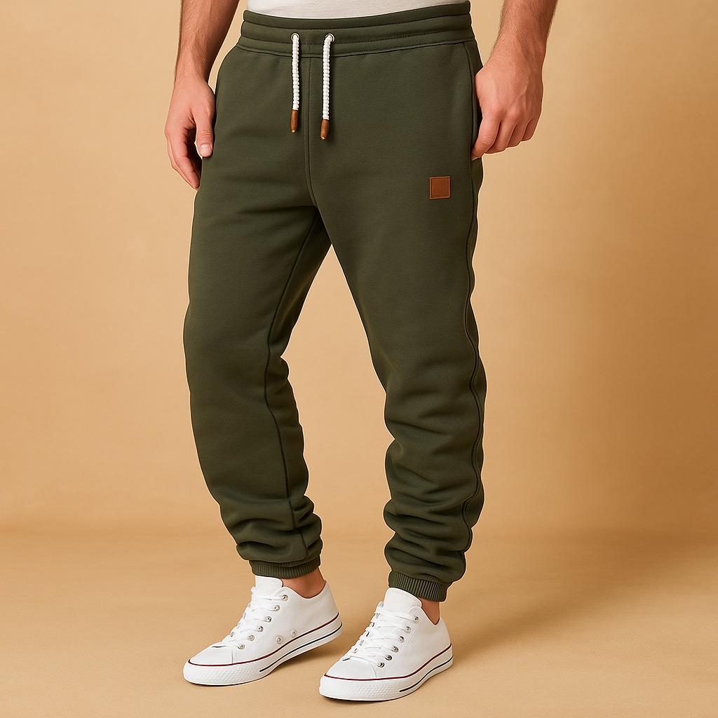 Men’s stylish jogger pants with adjustable waistband and side pockets, made from soft cotton blend for comfort and everyday wear.