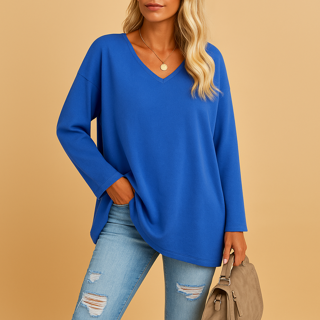 Women’s summer top with a round neckline and loose fit, suitable for casual outings, warm days, and stylish summer outfits.