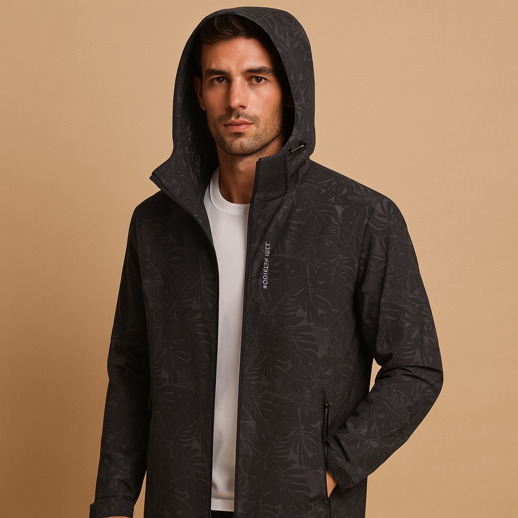 Men’s waterproof outdoor jacket with adjustable hood, zippered pockets, and leaf pattern design, perfect for hiking and daily wear.
