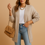 Women's classic knitted cardigan with a relaxed fit and open front, perfect for layering, casual wear, or cozy winter evenings.