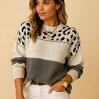 Women's oversized leopard print sweater with a relaxed fit and long sleeves, ideal for casual outfits, streetwear styles, and warm winter layering.