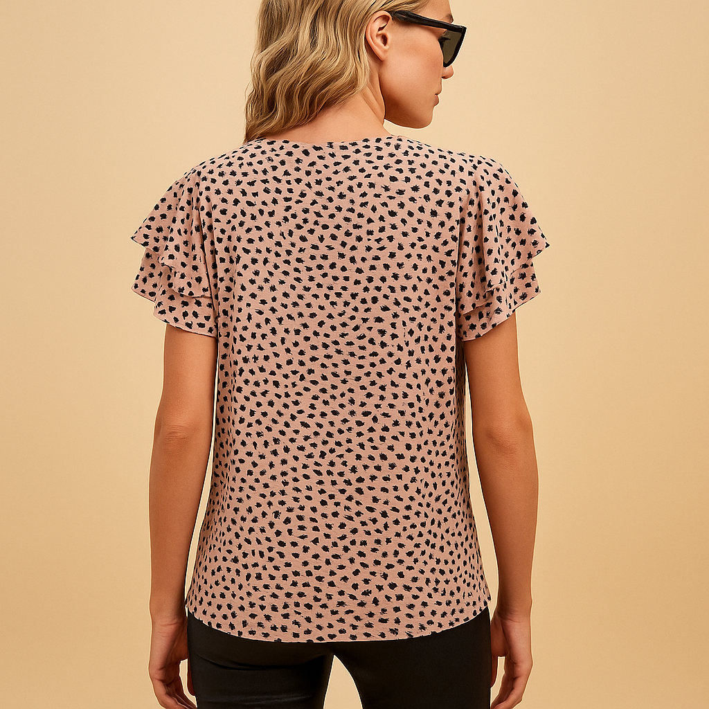 Women’s bold printed elegant top with a flowing and flattering fit, suitable for casual wear and more dressed-up occasions.