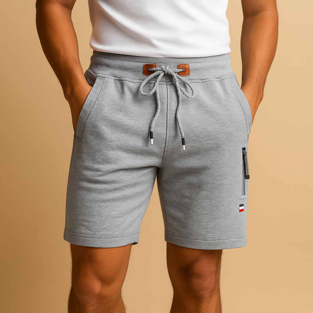 Men’s breathable sporty shorts with elastic waistband and multiple pockets, ideal for travel, outdoor activities, or everyday wear.