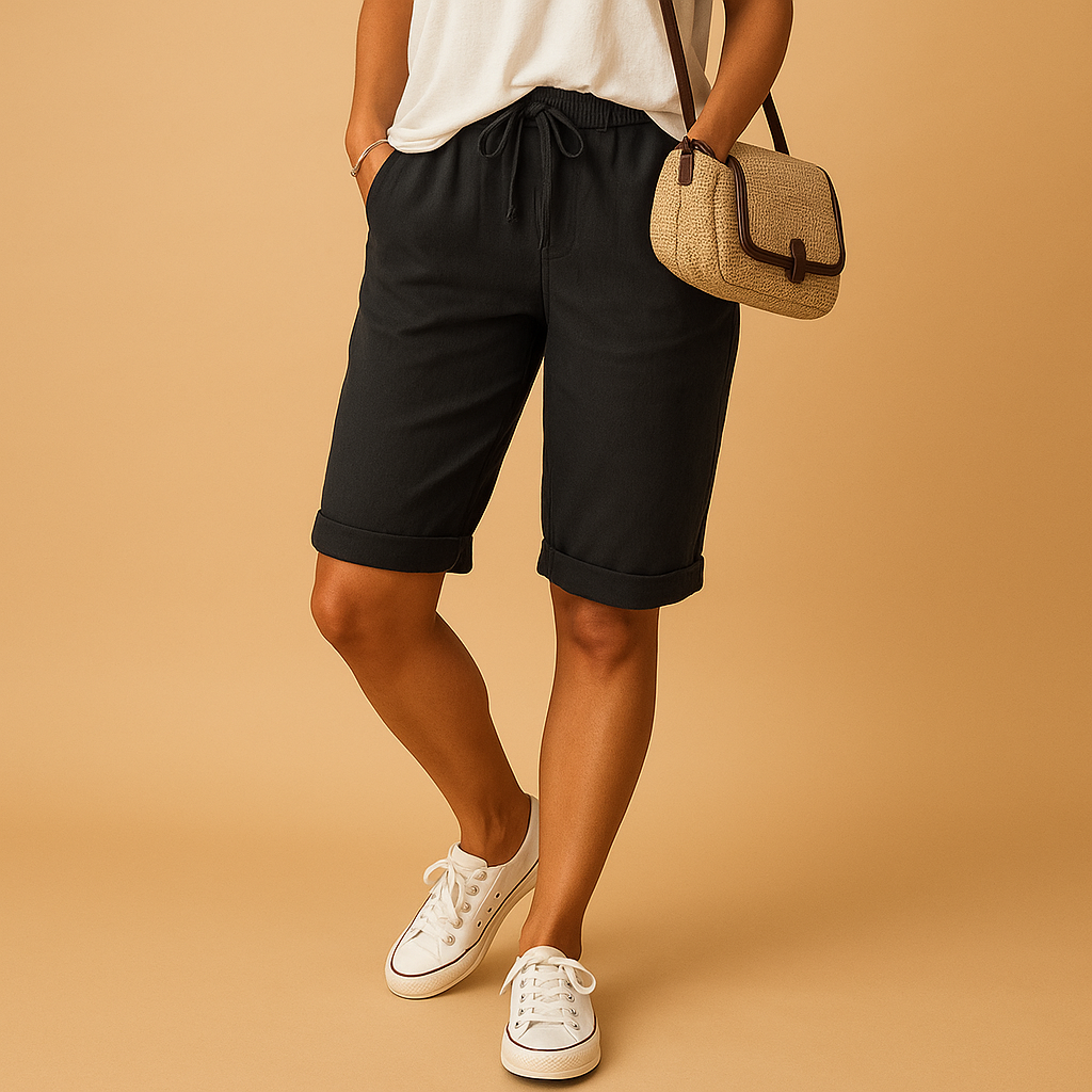 Women’s casual capri pants with elastic waistband, drawstring, and rolled hem design, perfect for spring and summer wear.