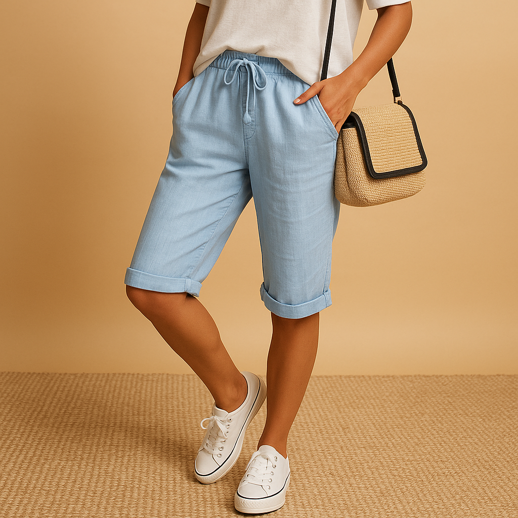 Women’s casual capri pants with elastic waistband, drawstring, and rolled hem design, perfect for spring and summer wear.