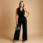 Chic wrap jumpsuit with wide legs for women in tailored fit, ideal for formal and stylish occasions.