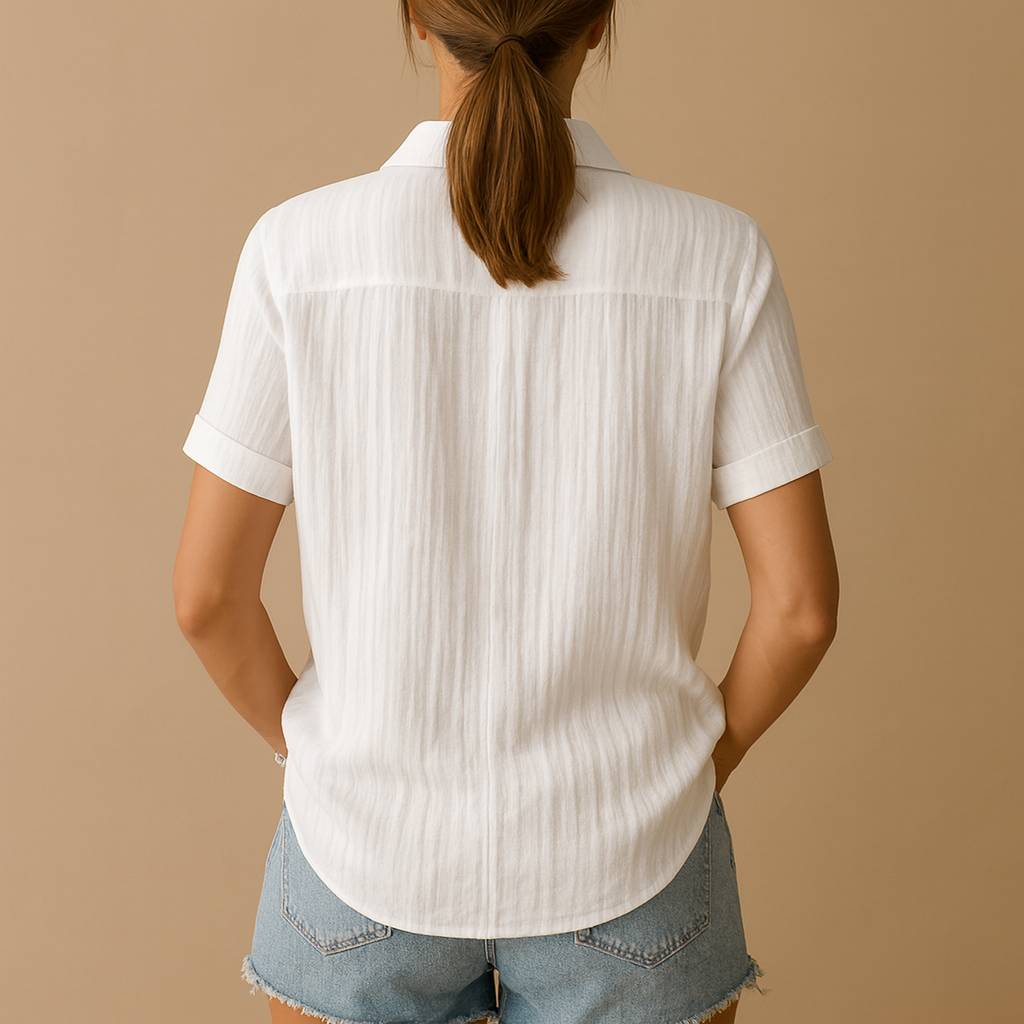 Classic short sleeve blouse for women with a relaxed fit and chest pocket, suitable for work, casual outfits, and warm days.