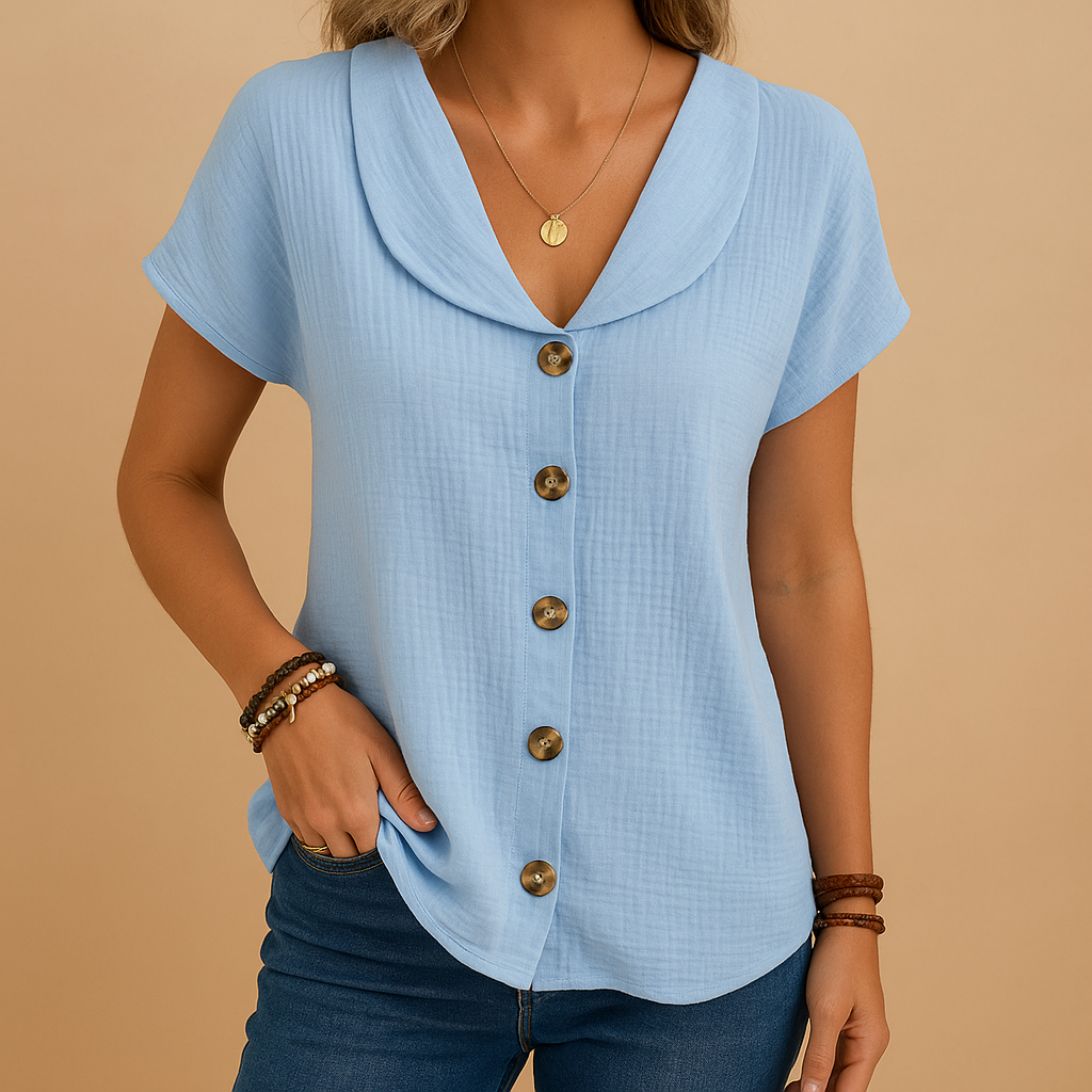 Women’s elegant button-up blouse with a classic collar and comfortable fit, suitable for casual looks and semi-formal outfits.
