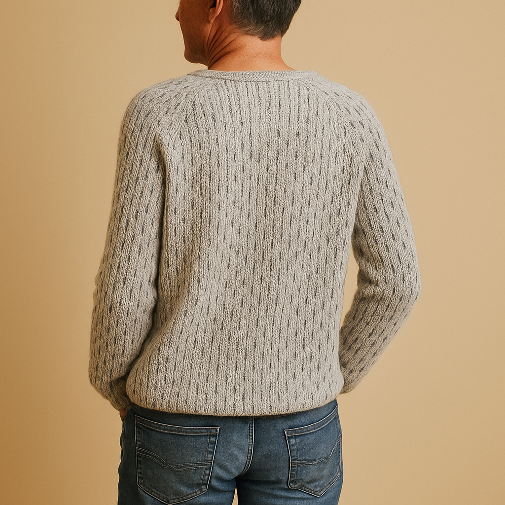 Elegant knitted winter sweater for women in breathable grey fabric with relaxed fit, perfect for layering in work, casual, or cozy outfits.