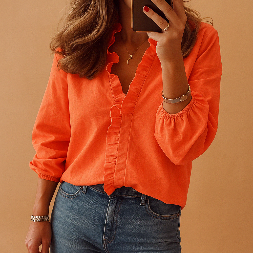 Elegant women’s blouse with ruffle detailing and flattering fit, perfect for work, casual outfits, and formal occasions.