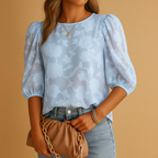Women’s floral elegant top with a chic fit, ideal for casual wear or formal outfits with jeans or skirts.