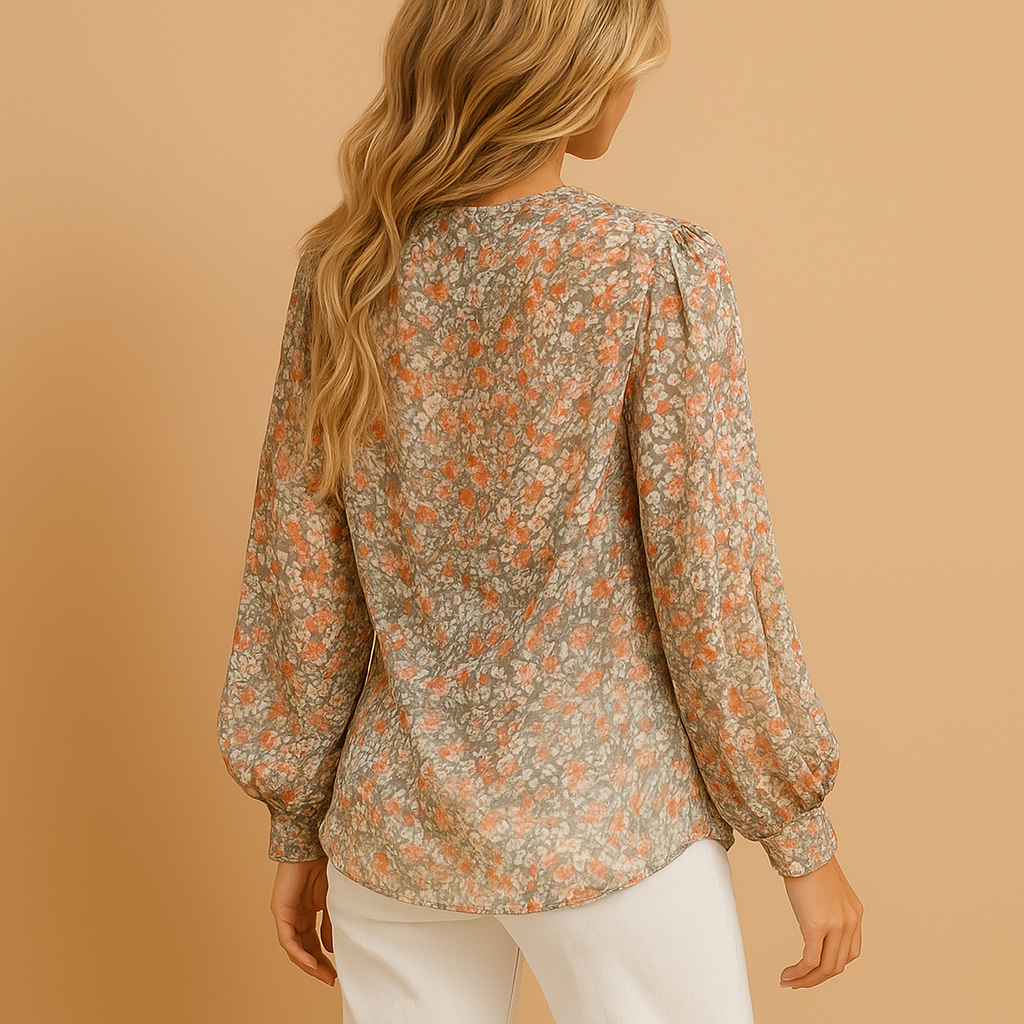Women’s floral summer blouse with long sleeves, ideal for warm days, casual outfits, and stylish summer occasions.