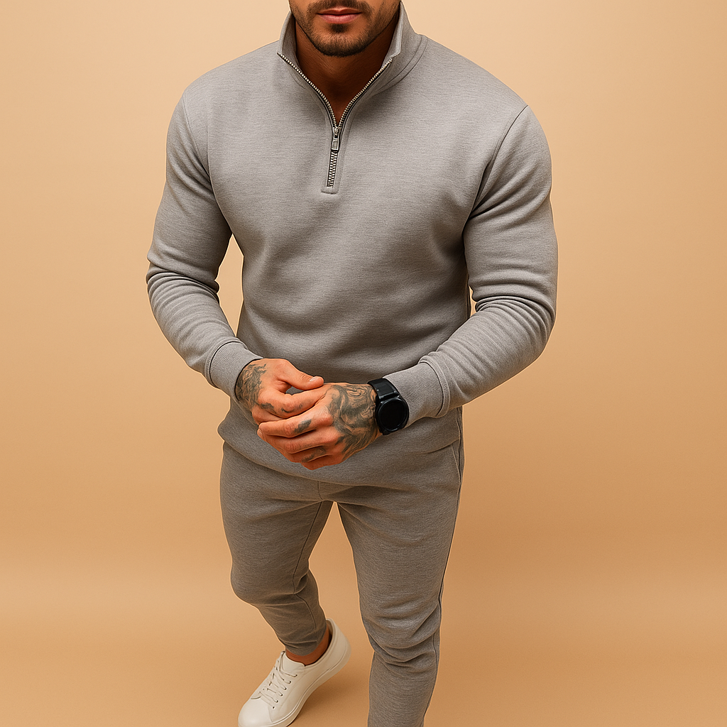 Men’s half-zip tracksuit with sweatshirt and joggers, perfect for sports, lounging, or casual wear.