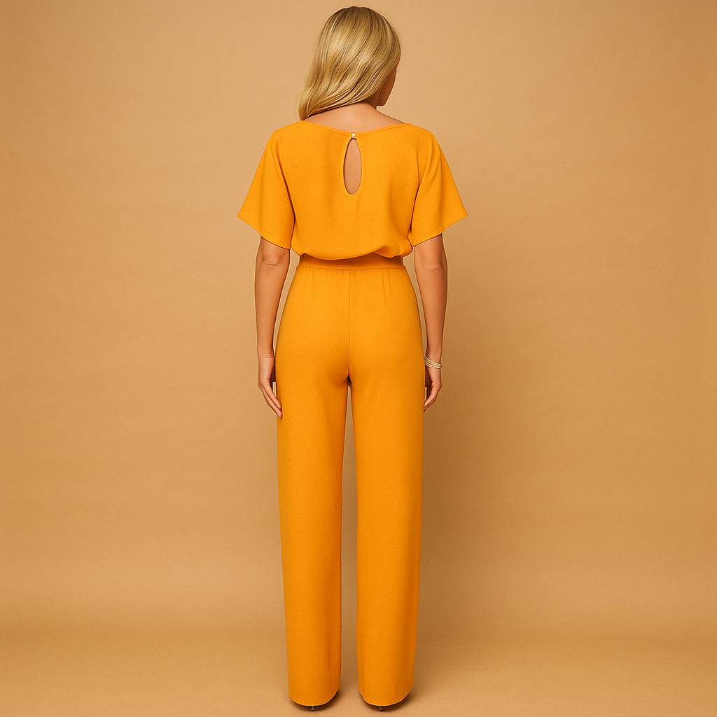 High-waisted women’s jumpsuit with lace-up detail and flowing fit, ideal for work, evening wear, and stylish casual looks.