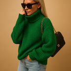 Women’s knitted pullover sweater with relaxed fit and breathable knit, ideal for warmth, daily wear, and versatile winter layering.