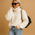 Women’s knitted pullover sweater with relaxed fit and breathable knit, ideal for warmth, daily wear, and versatile winter layering.