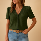 Women’s lace V-neck blouse with elegant detailing, flattering fit, and soft fabric, ideal for work, parties, or special events.