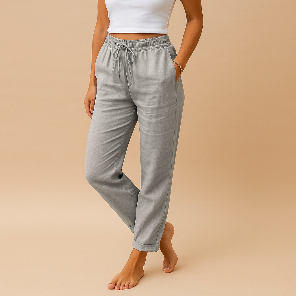 Women’s lightweight trousers with elastic waistband and feminine cut, designed with flowy fabric for casual wear or formal occasions.