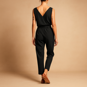 Women’s lightweight V-neck jumpsuit with adjustable waist and relaxed fit, perfect for summer days, beach trips, and casual outings.