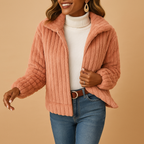 Women’s long fleece jacket with stand collar and pockets, perfect for warmth and stylish winter layering.