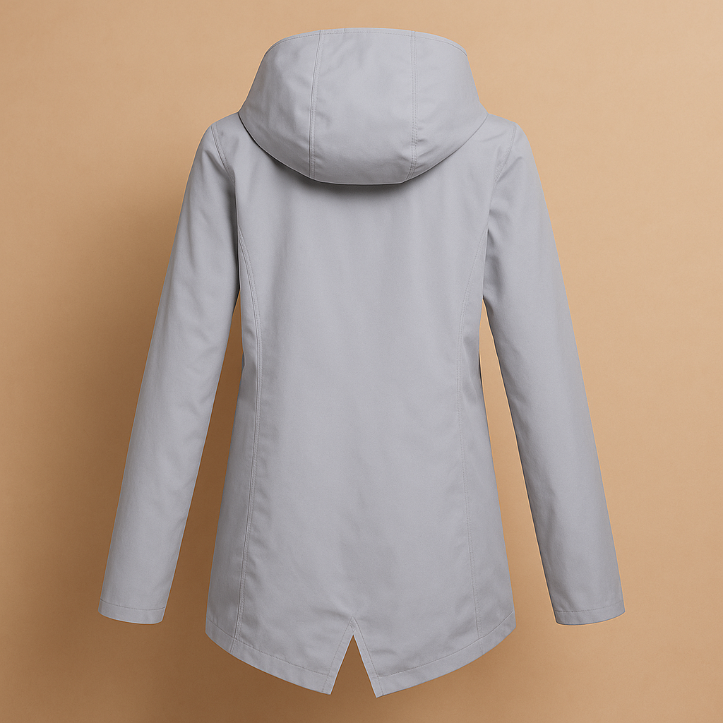 Women’s long waterproof raincoat with hood and breathable design, suitable for rainy days, commuting, and everyday outdoor wear.