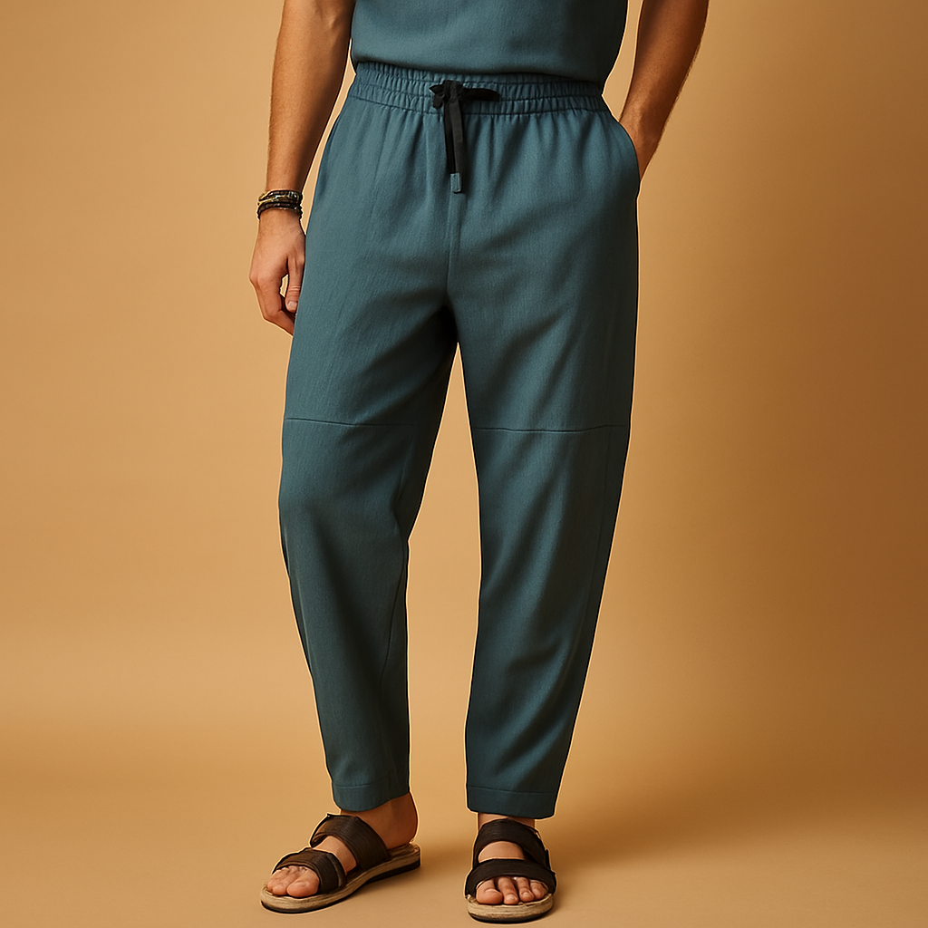 Men’s loose cotton pants with breathable fabric and relaxed fit, perfect for warm days, travel, or casual everyday wear.