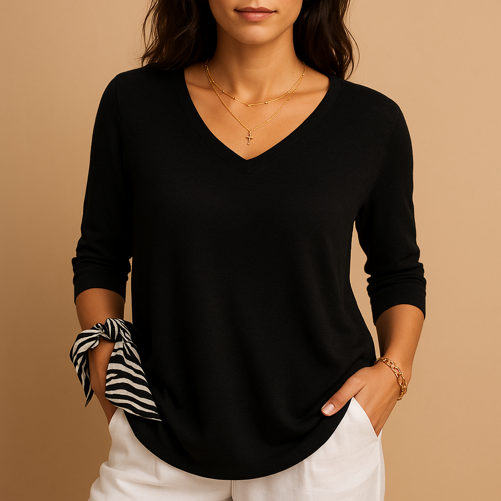 Luxury loose fit top for women with a modern elegant design, suitable for daily wear, relaxing moments, and informal outings.