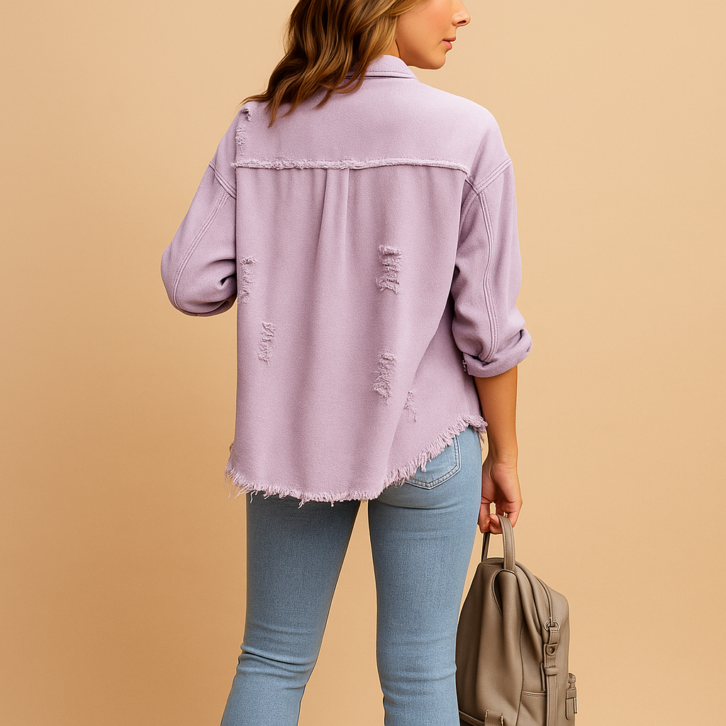 Women’s oversized vintage denim jacket with a relaxed fit and distressed details, ideal for casual outfits, layering, and trendy city looks.