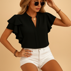 Women’s sleeveless elegant blouse with tailored fit, perfect for work, casual looks, or evening wear in classic tones.