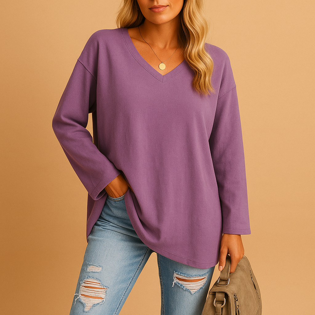 Women’s summer top with a round neckline and loose fit, suitable for casual outings, warm days, and stylish summer outfits.
