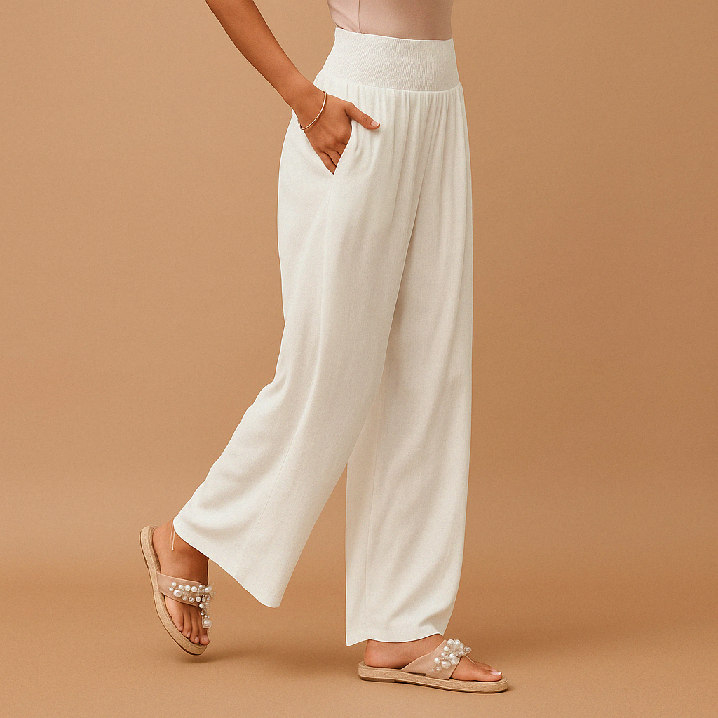 Women’s lightweight summer trousers with elastic waistband and loose straight legs, ideal for casual outings and relaxed summer days.