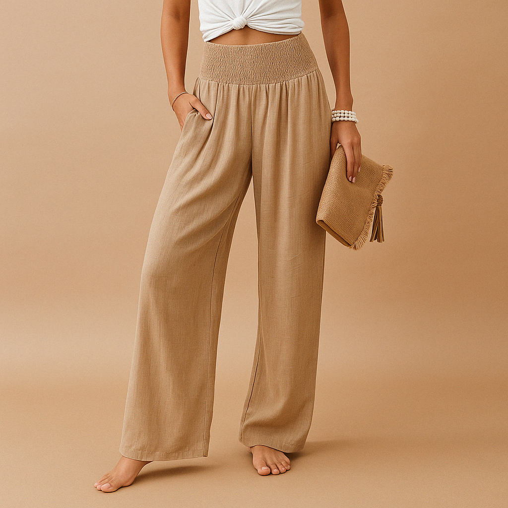 Women’s lightweight summer trousers with elastic waistband and loose straight legs, ideal for casual outings and relaxed summer days.