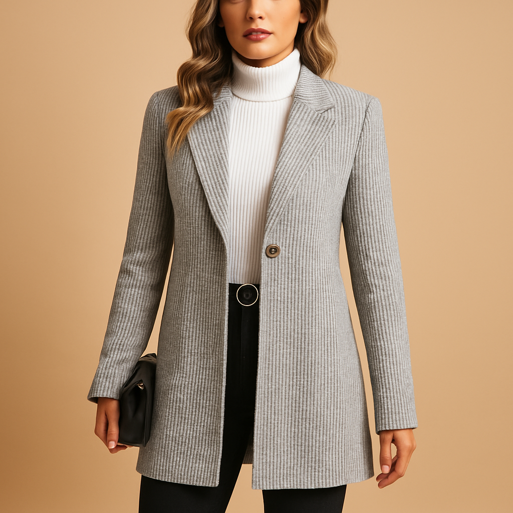 Tailored women’s blazer with long sleeves and a refined fit, ideal for business and formal styling.