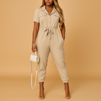 Tailored one-piece jumpsuit for women with refined button closure and flattering silhouette, perfect for office wear and evening outings.