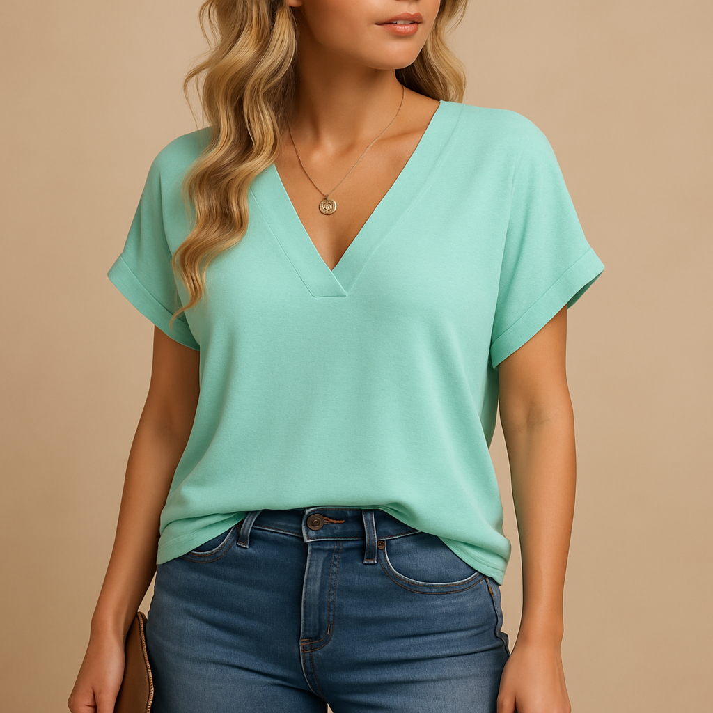Women’s v-neck blouse with short puff sleeves and a flattering fit, suitable for work outfits, casual wear, and relaxed occasions.