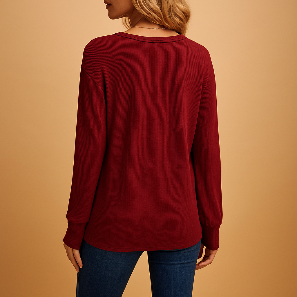 Women’s v-neck blouse with button details and a loose fit, suitable for everyday wear, office outfits, and smart casual looks.