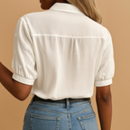 Women’s white elegant blouse with classic collar and tailored fit, perfect for work, casual days, or stylish evenings.