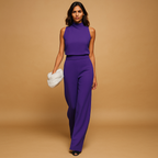 Elegant women’s jumpsuit with halter neckline, wide legs, and bow detail – perfect for parties, dinners, and evenings out.
